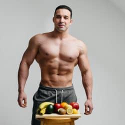 sexy-vegan-guy-with-naked-torso-posing-fruit-diet-healthy-diet_sm