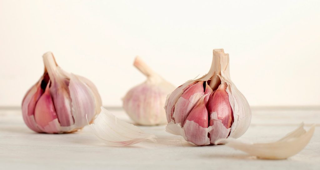 three Raw Garlic cloves